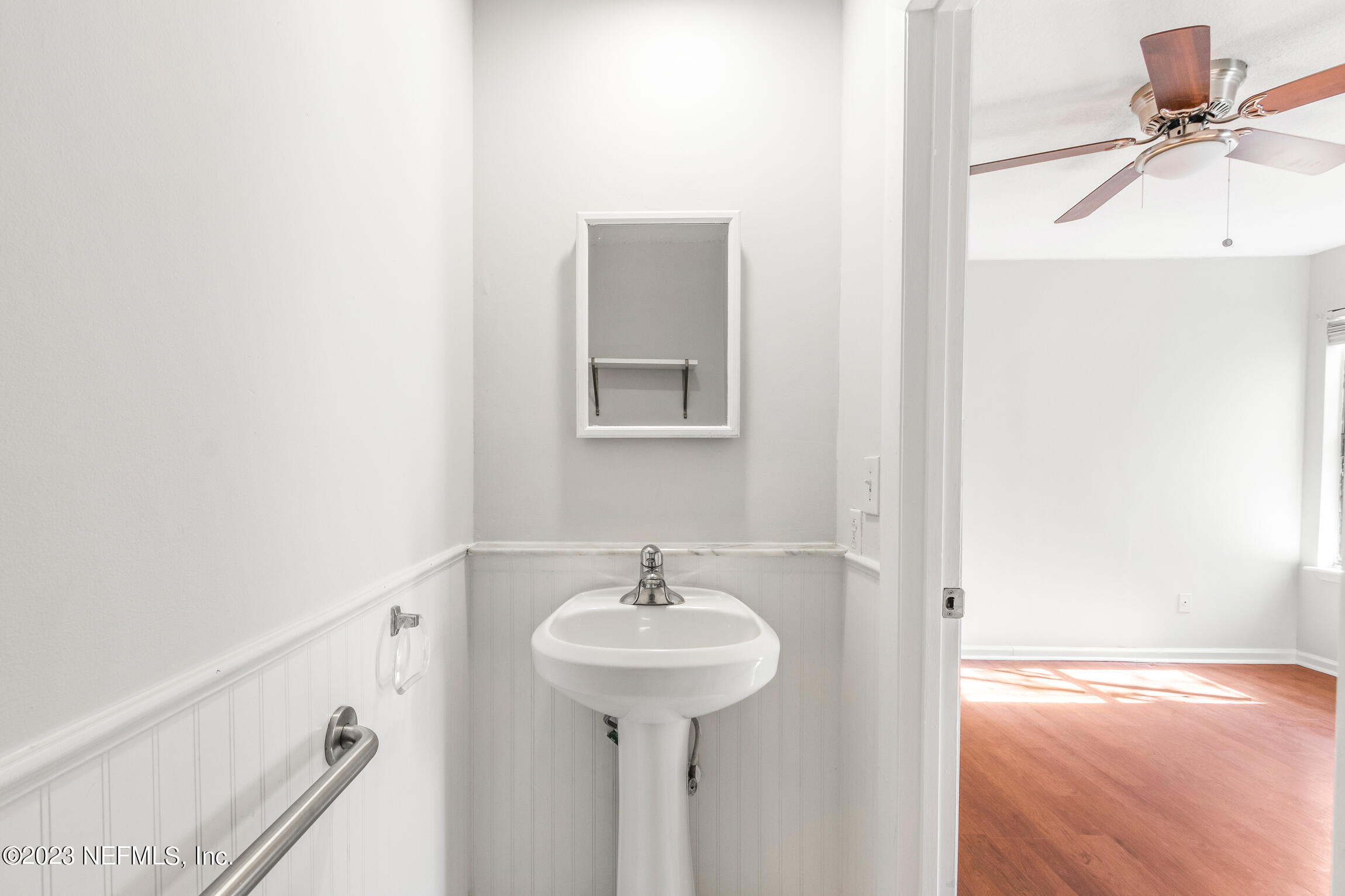 12770 Attrill Road Jacksonville, FL 32258 - Photo 13 of 38 a bathroom with a sink and a mirror