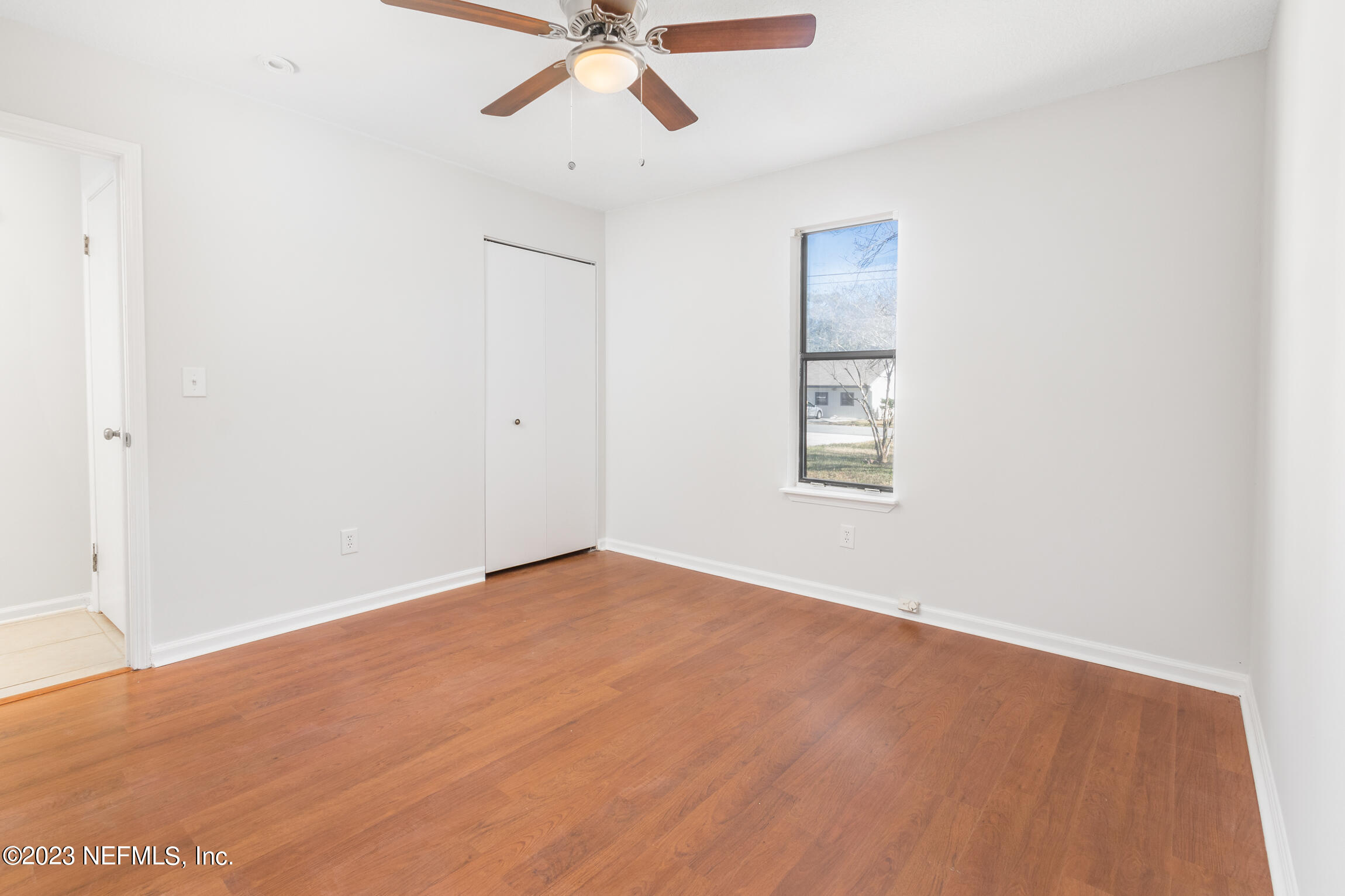 12770 Attrill Road Jacksonville, FL 32258 - Photo 15 of 38 a view of an empty room with a window