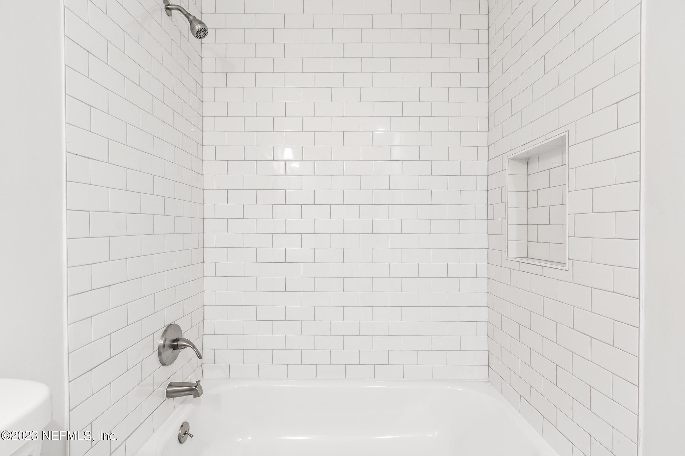 12770 Attrill Road Jacksonville, FL 32258 - Photo 21 of 38 a bathroom with a bathtub