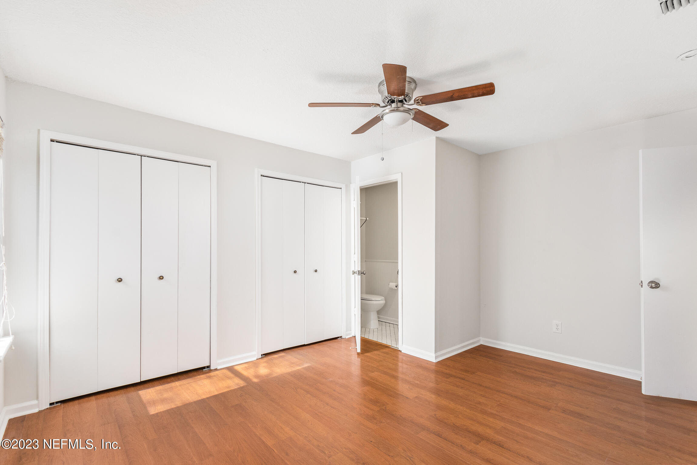 12770 Attrill Road Jacksonville, FL 32258 - Photo 10 of 38 a view of empty room with wooden floor