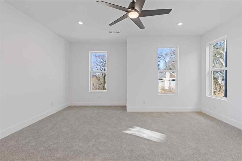 489 Hammons Way Southeast Atlanta, GA 30315 - Photo 16 of 47 a view of a livingroom with a window and a ceiling fan