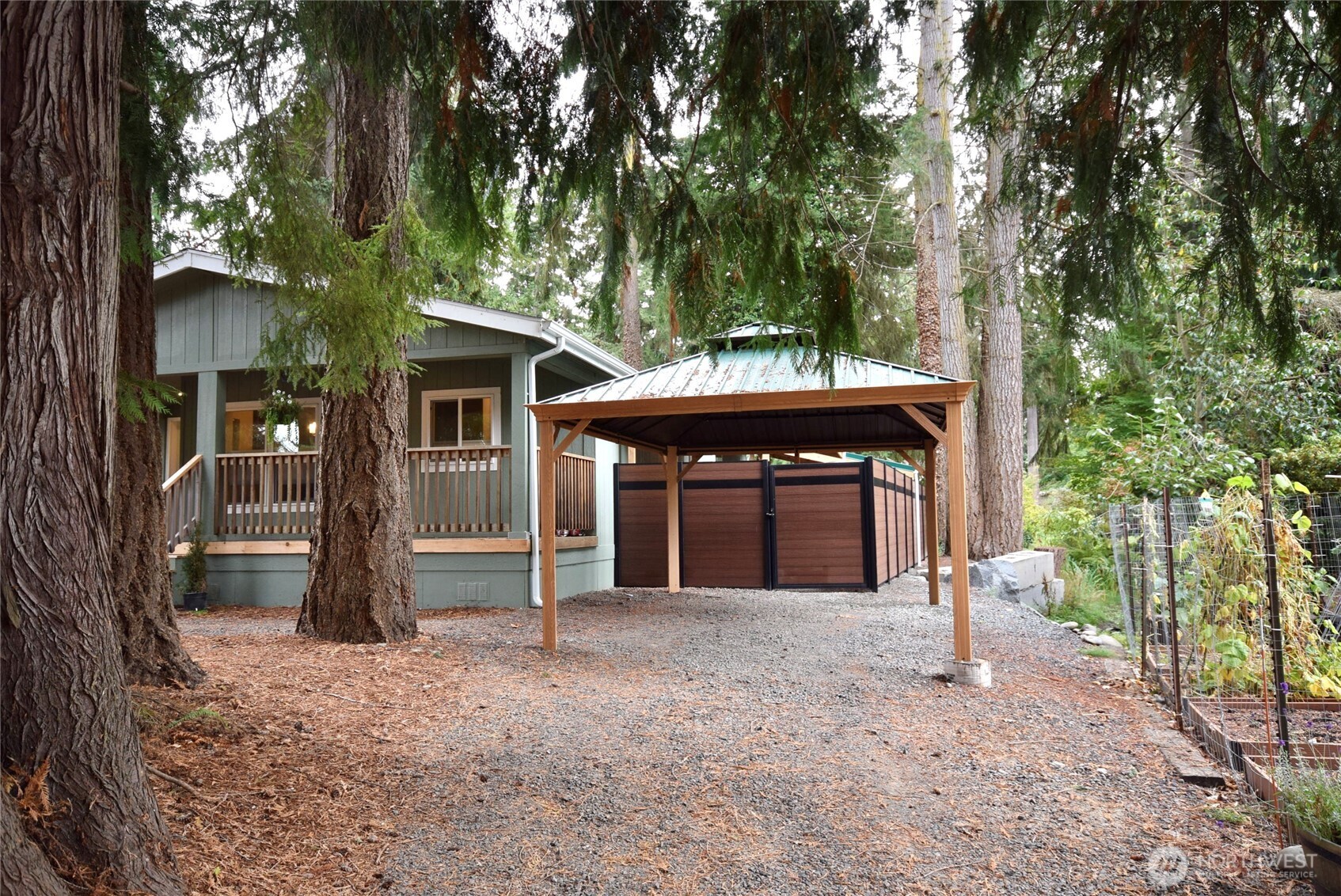 375 Dungeness Meadows Sequim, WA 98382 - Photo 22 of 27 a front view of a house with a yard