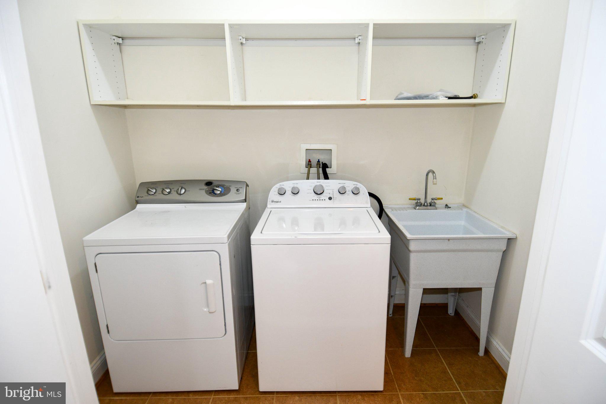 1924 Leonard Road Falls Church, VA 22043 - Photo 44 of 61 Modern laundry space with ample storage.