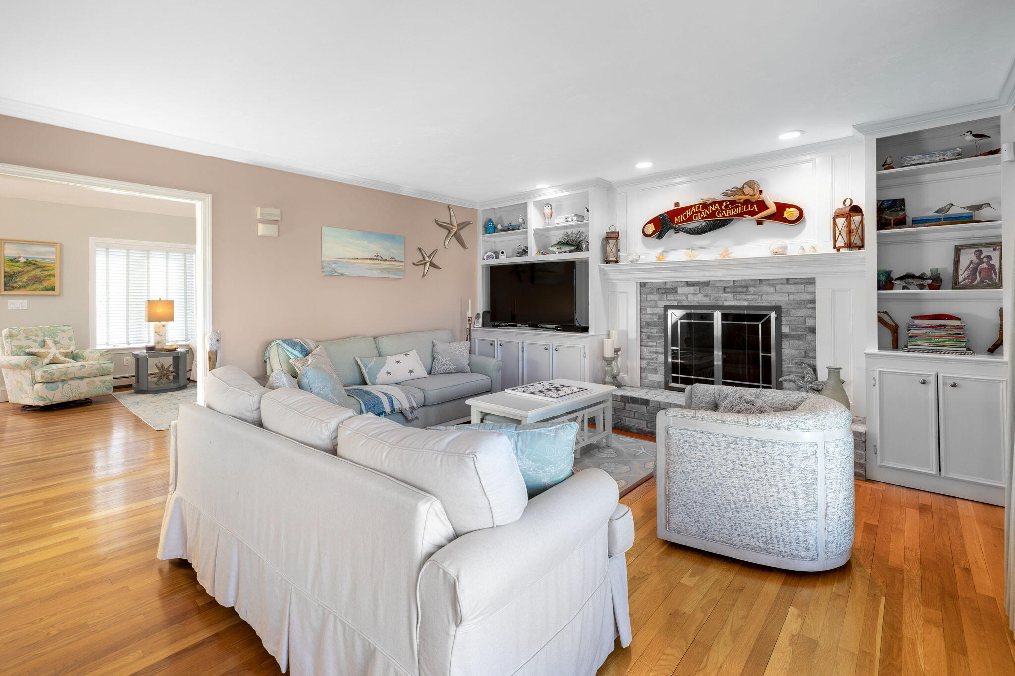 33 Torrey Road East Sandwich, MA 02537 - Photo 14 of 39 a living room with furniture and a fireplace