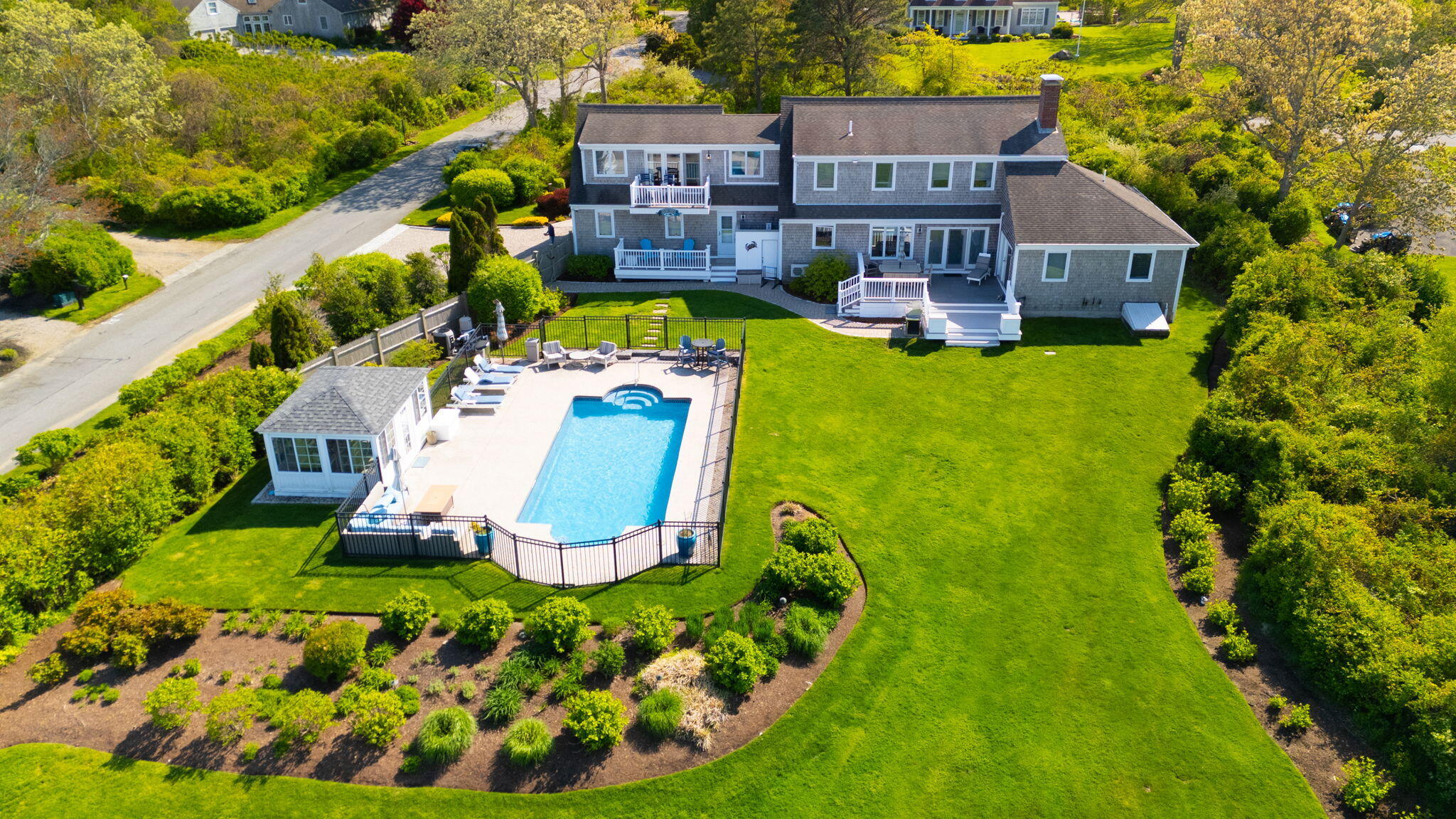 33 Torrey Road East Sandwich, MA 02537 - Photo 2 of 39 an aerial view of a house with swimming pool and garden