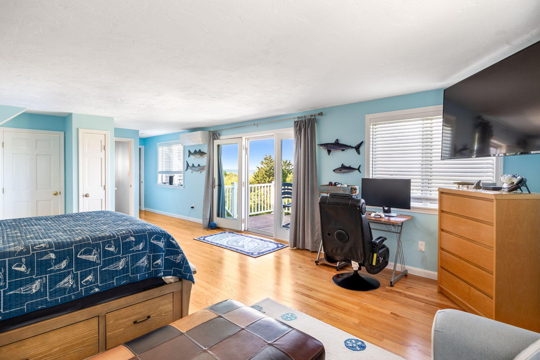 33 Torrey Road East Sandwich, MA 02537 - Photo 22 of 39 a bedroom with a bed and wooden floor