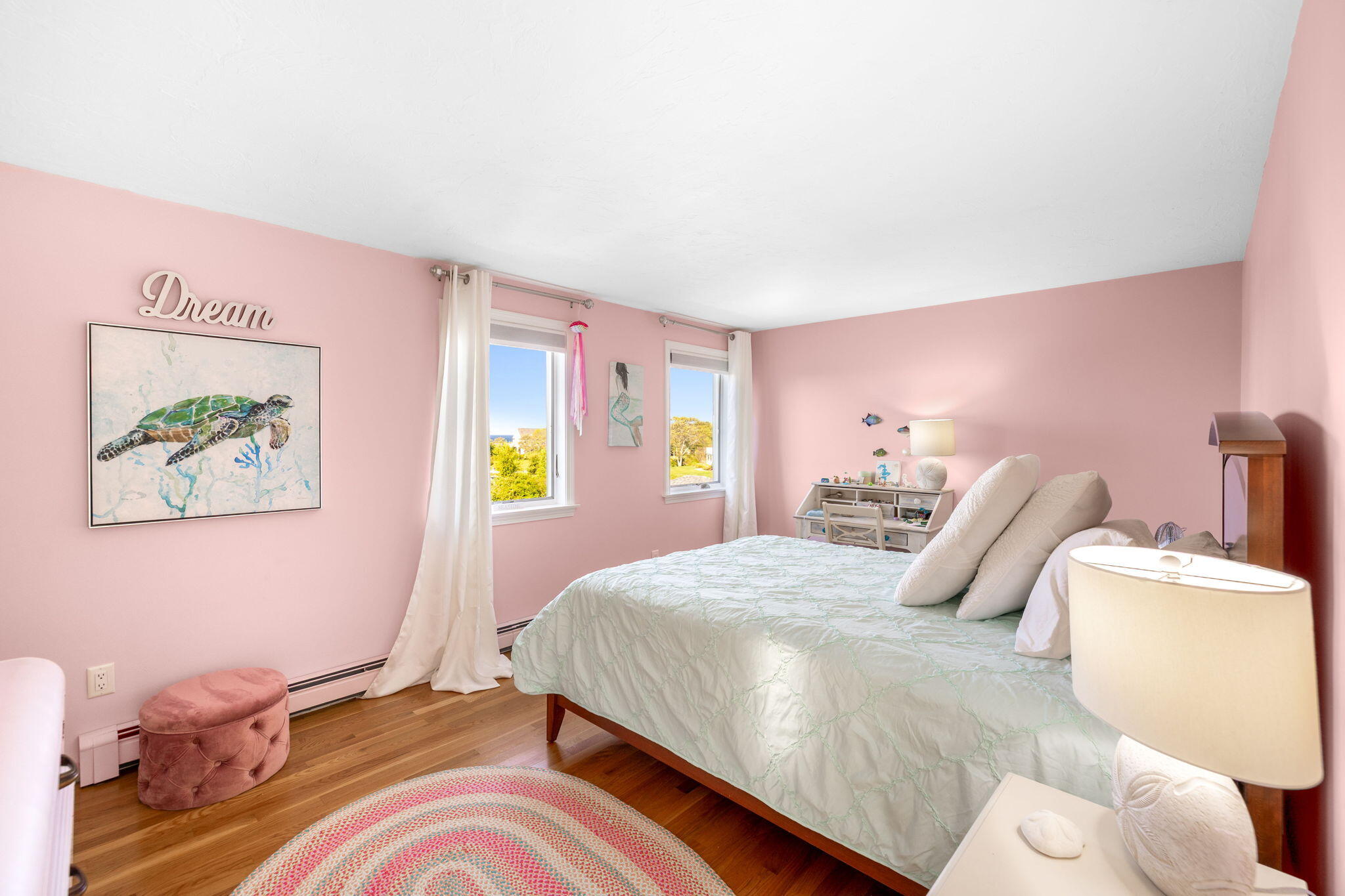 33 Torrey Road East Sandwich, MA 02537 - Photo 27 of 39 a bedroom with a bed and a painting on the wall