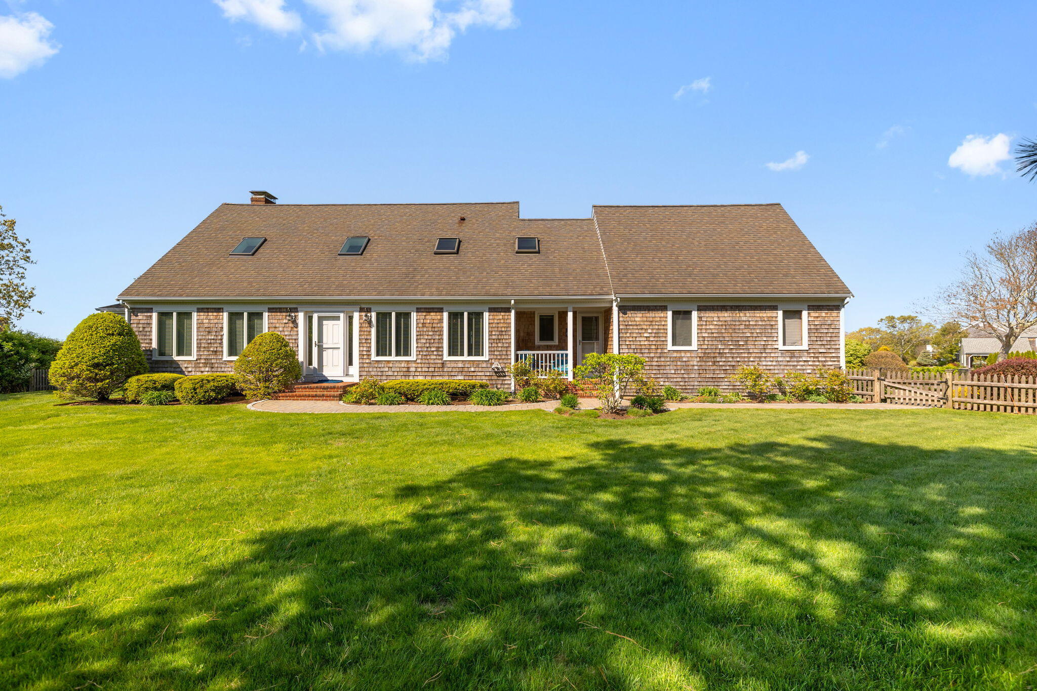 33 Torrey Road East Sandwich, MA 02537 - Photo 32 of 39 a front view of a house with a garden