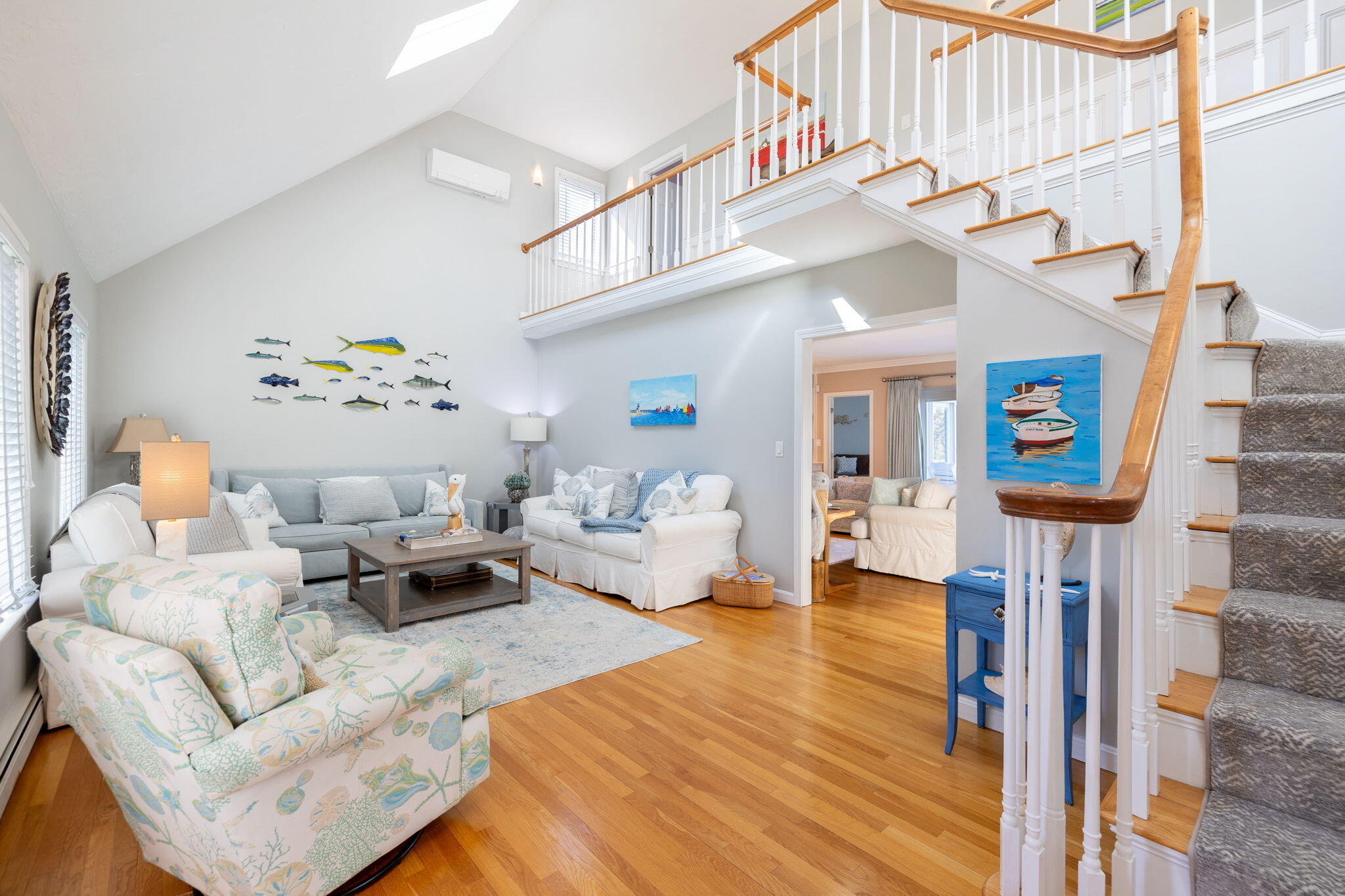 33 Torrey Road East Sandwich, MA 02537 - Photo 6 of 39 a living room with furniture a fireplace and a chandelier
