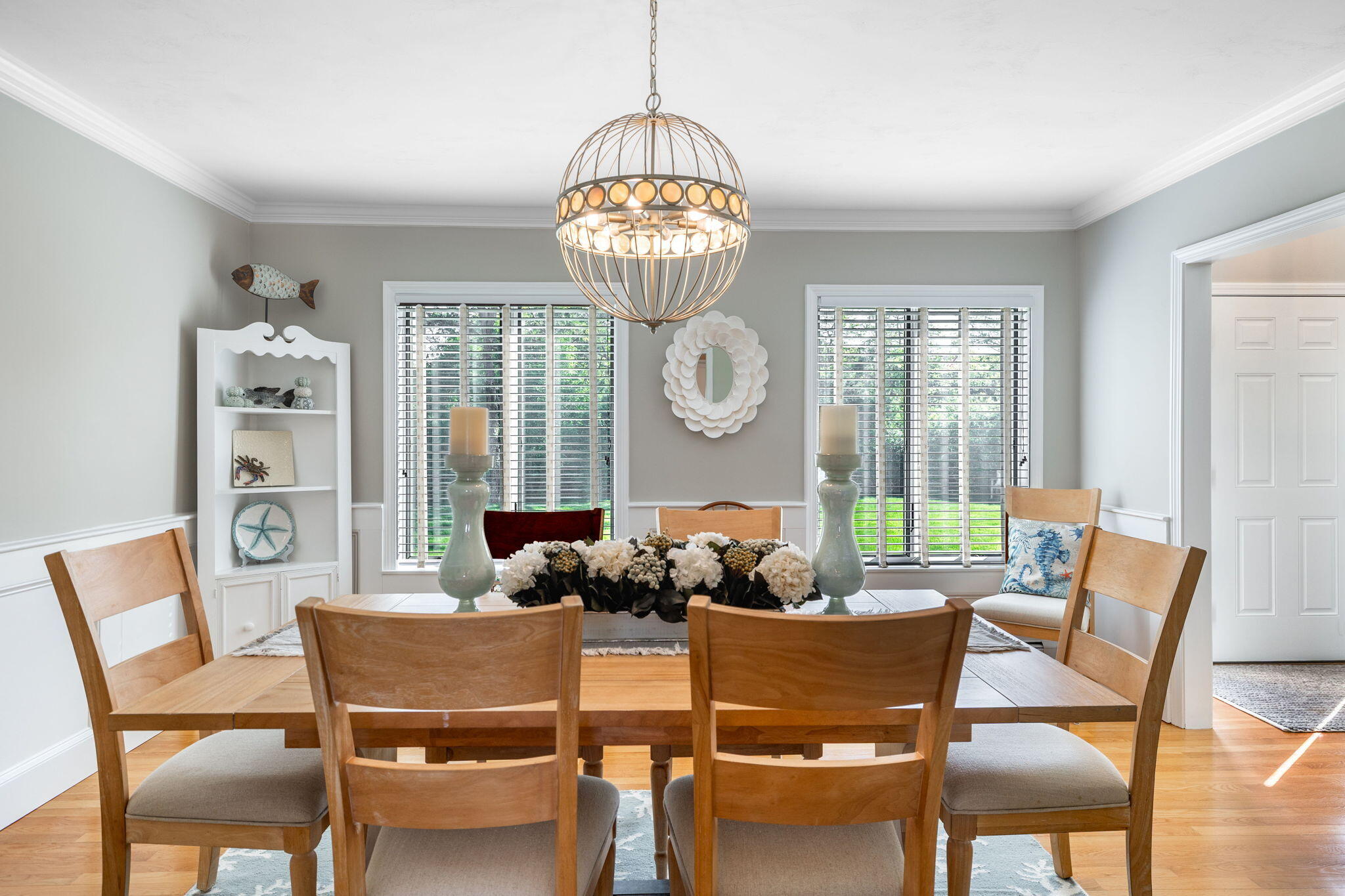 33 Torrey Road East Sandwich, MA 02537 - Photo 8 of 39 a dining room with furniture a chandelier and wooden floor