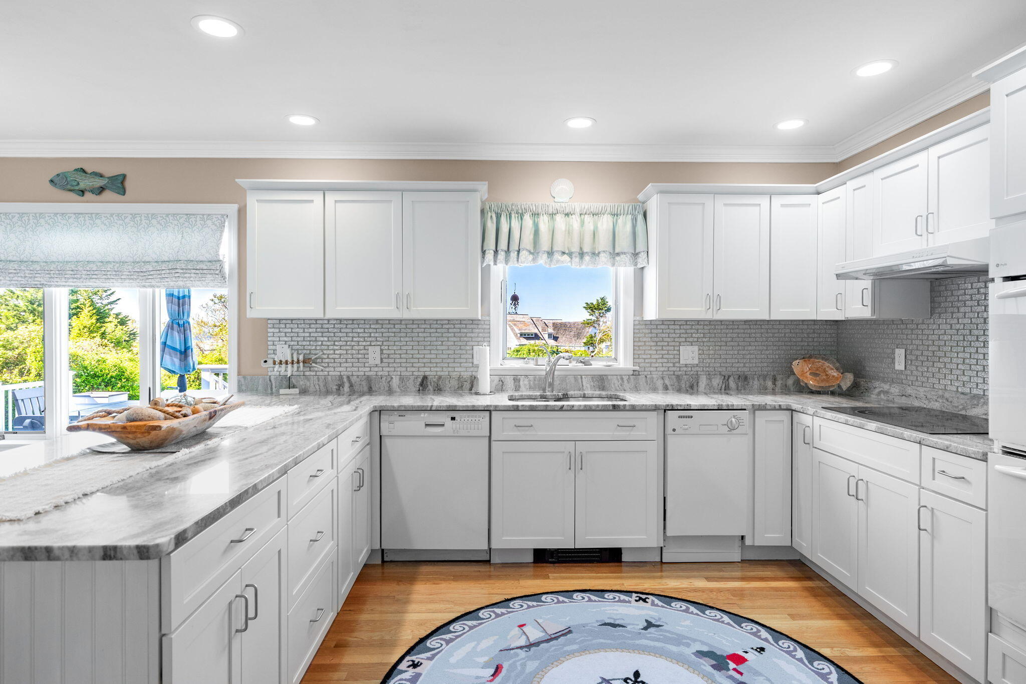 33 Torrey Road East Sandwich, MA 02537 - Photo 9 of 39 a kitchen with stainless steel appliances granite countertop a sink stove and cabinets