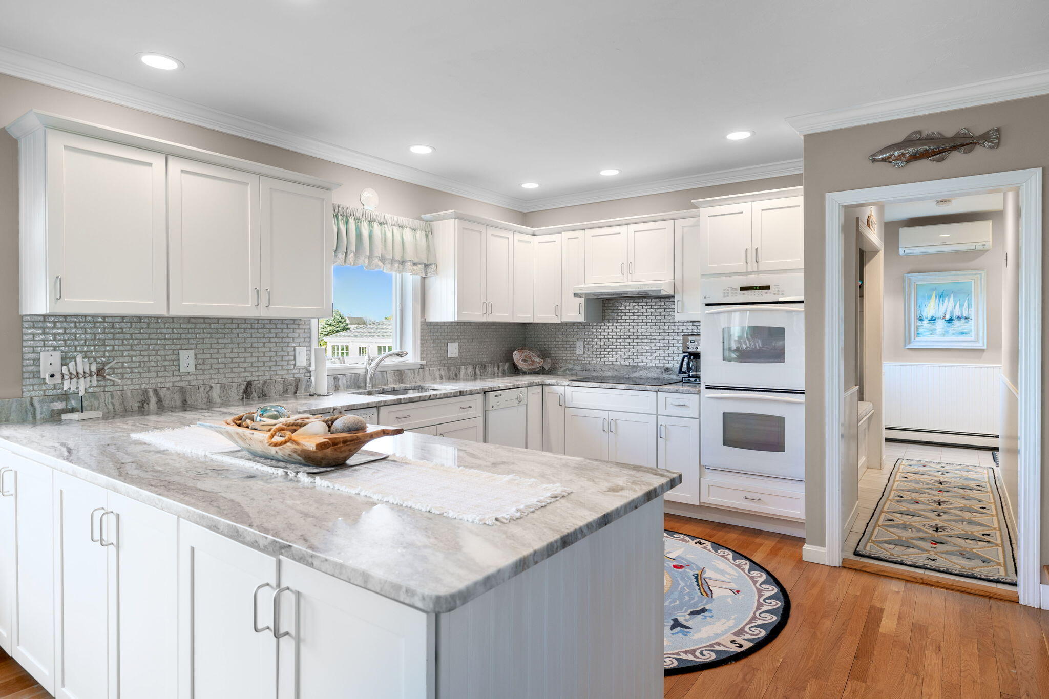 33 Torrey Road East Sandwich, MA 02537 - Photo 10 of 39 a kitchen with a refrigerator sink and cabinets