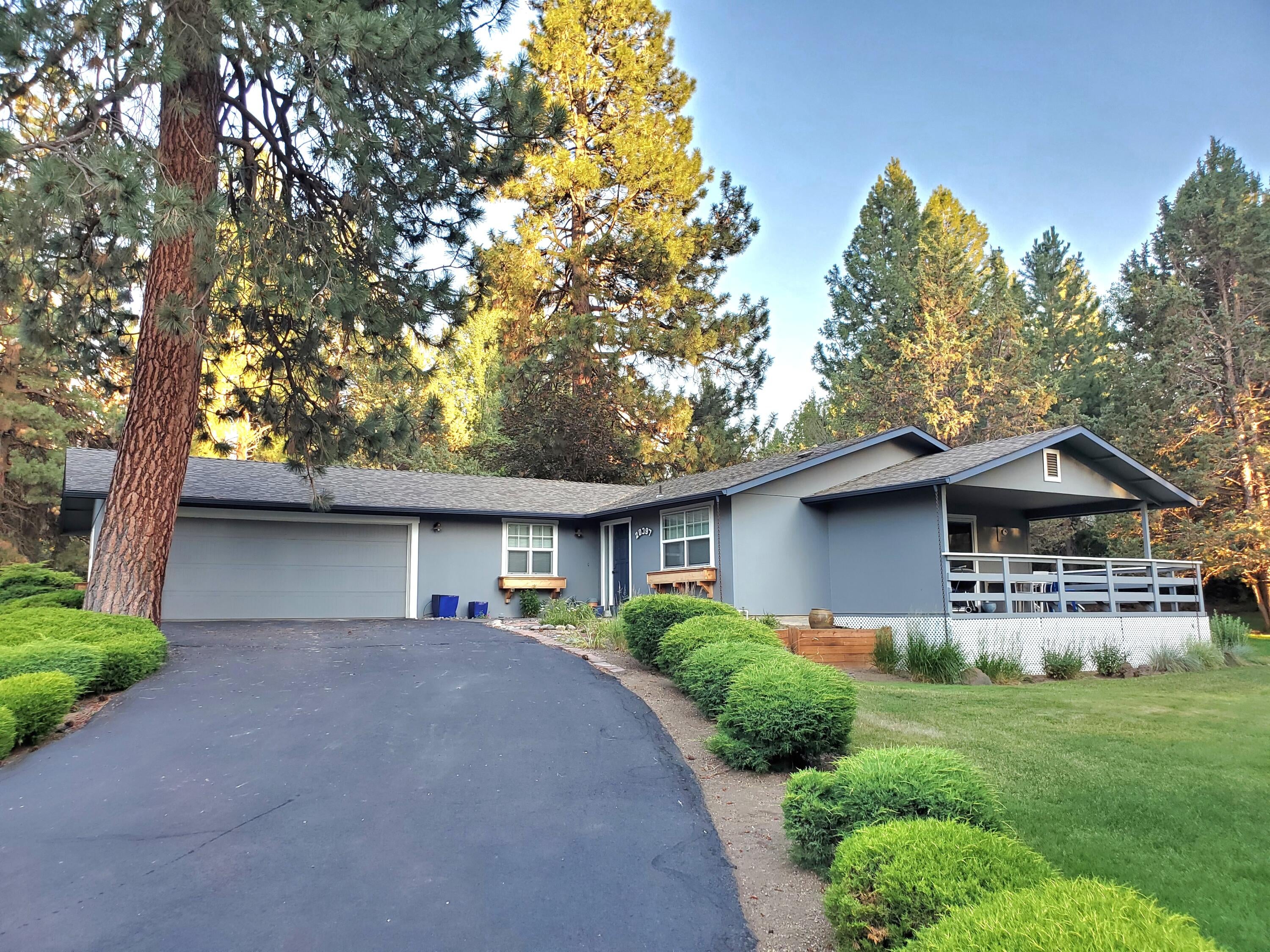 20397 Strawline Road Bend, OR 97702 - Photo 1 of 25 Long paved driveway and oversized garage.