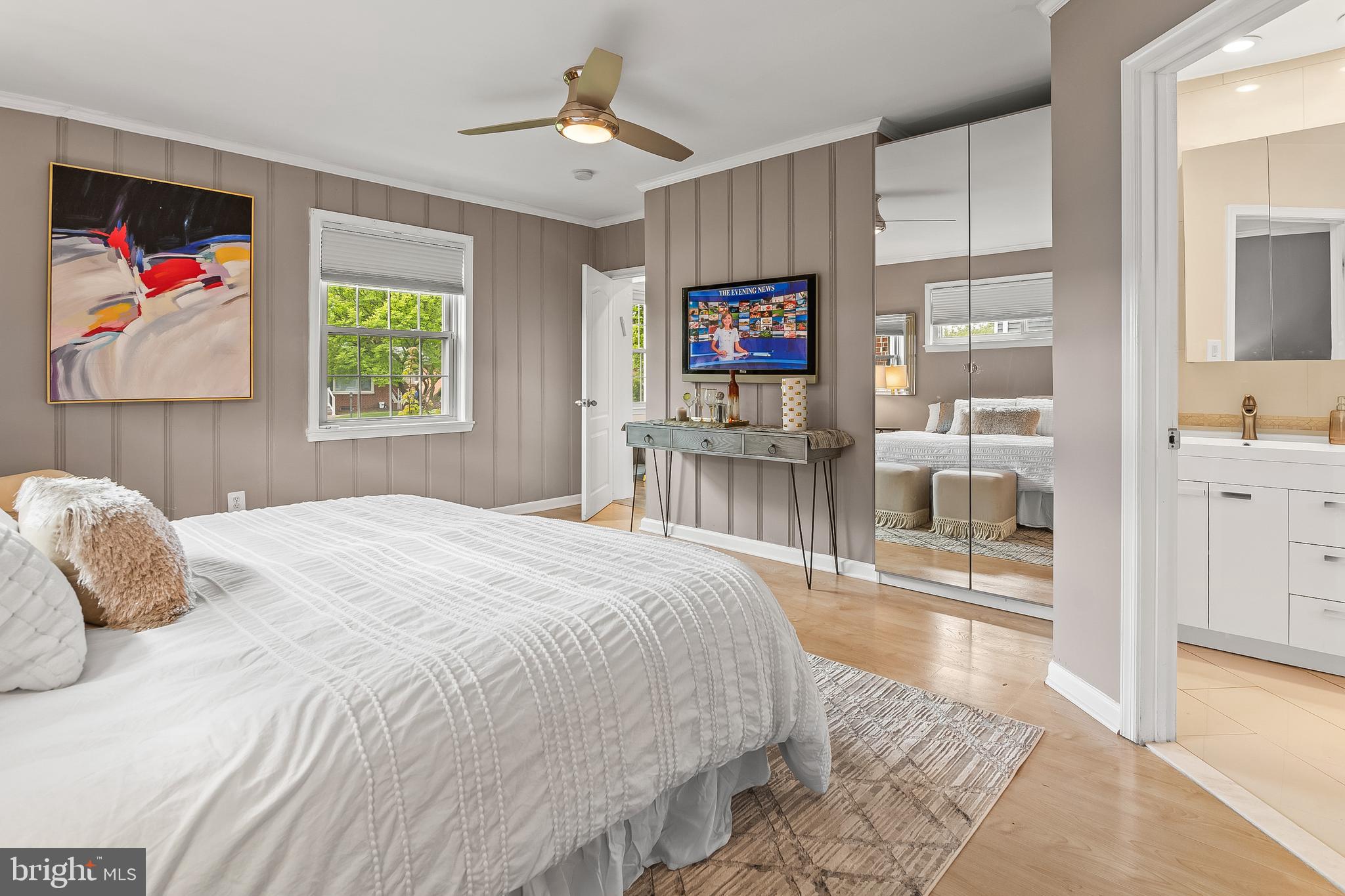 3302 Northbrook Road Pikesville, MD 21208 - Photo 23 of 45 a bedroom with a bed and a painting on the wall