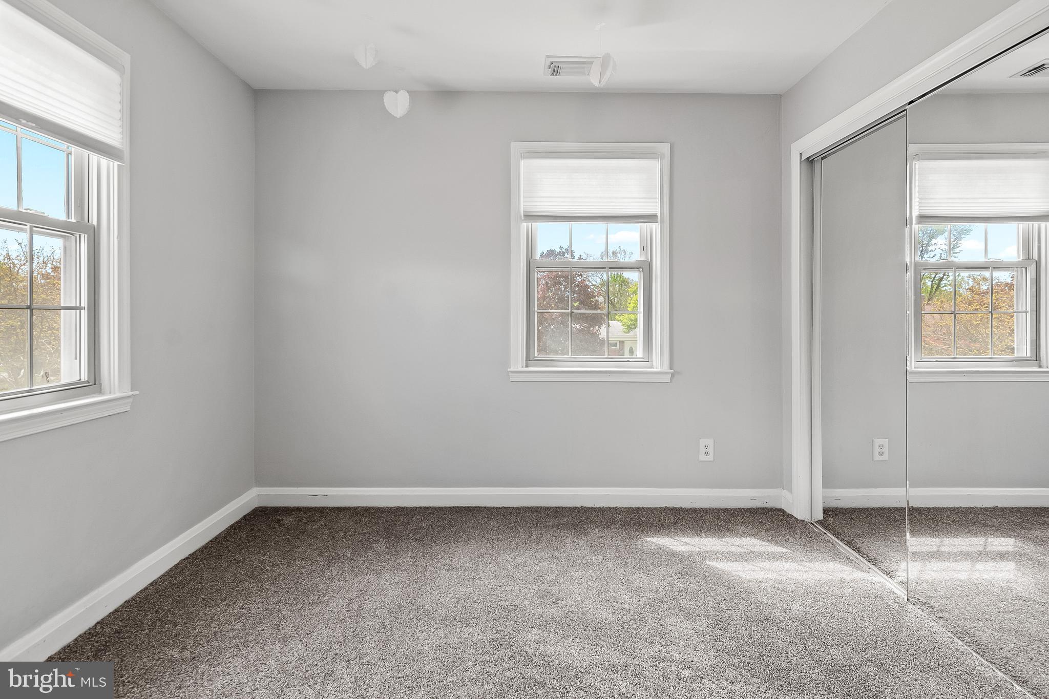 3302 Northbrook Road Pikesville, MD 21208 - Photo 29 of 45 an empty room with windows