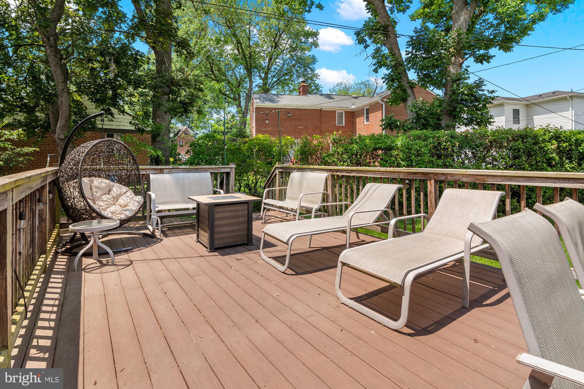 3302 Northbrook Road Pikesville, MD 21208 - Photo 37 of 45 a view of a patio with couches chairs and wooden floor