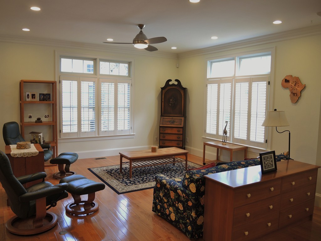 38 Maple Street, Unit 2 Needham, MA 02492 - Photo 11 of 26 a living room with furniture and a window