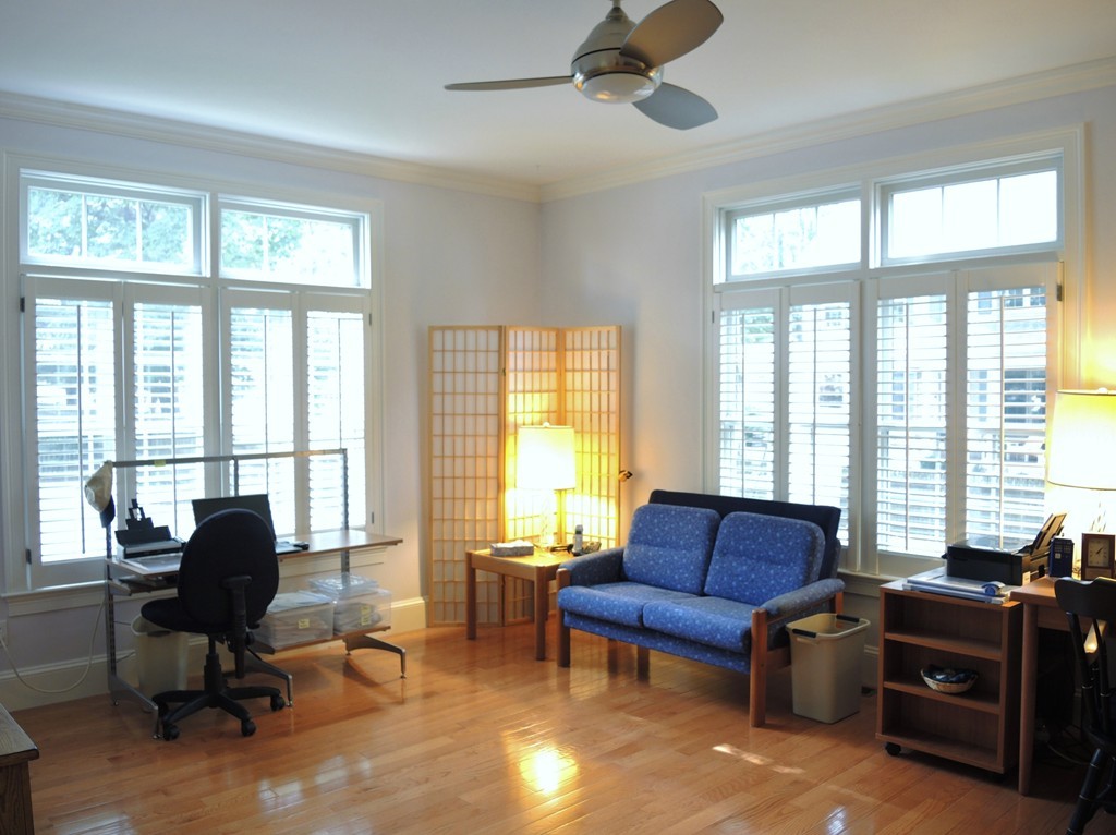 38 Maple Street, Unit 2 Needham, MA 02492 - Photo 13 of 26 a living room with furniture and a window