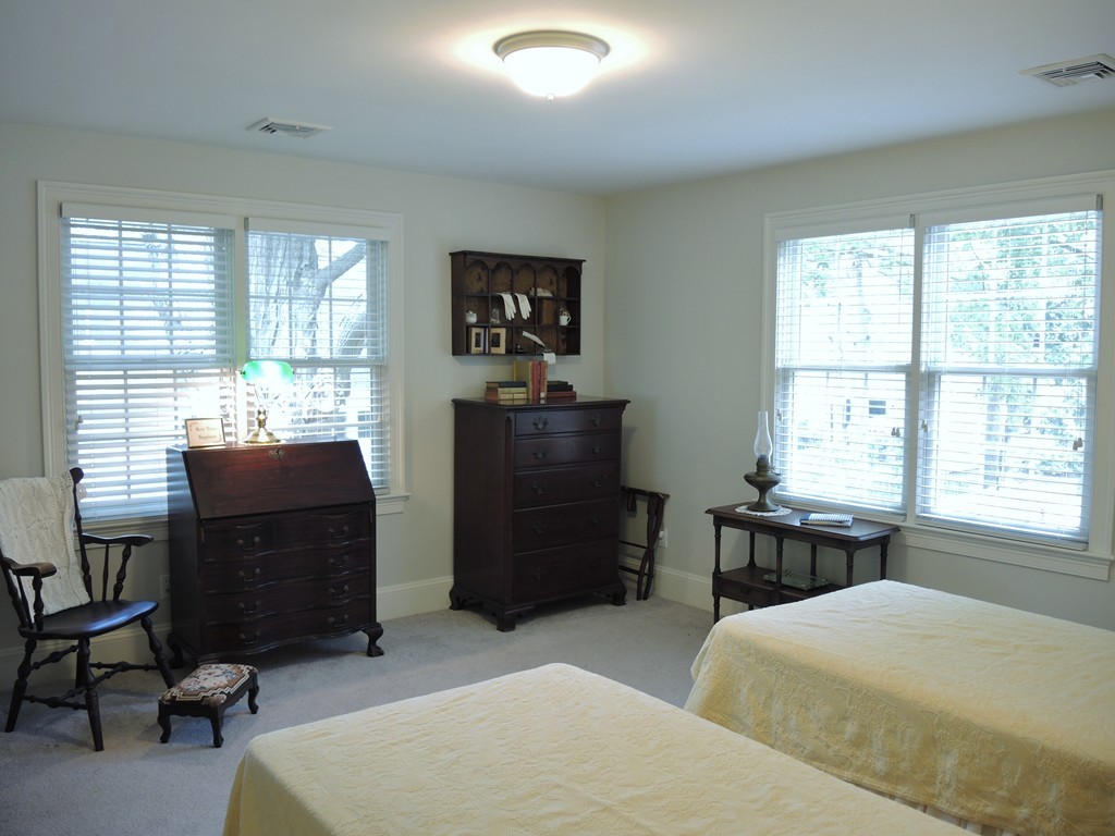 38 Maple Street, Unit 2 Needham, MA 02492 - Photo 14 of 26 a bedroom with a bed and a window