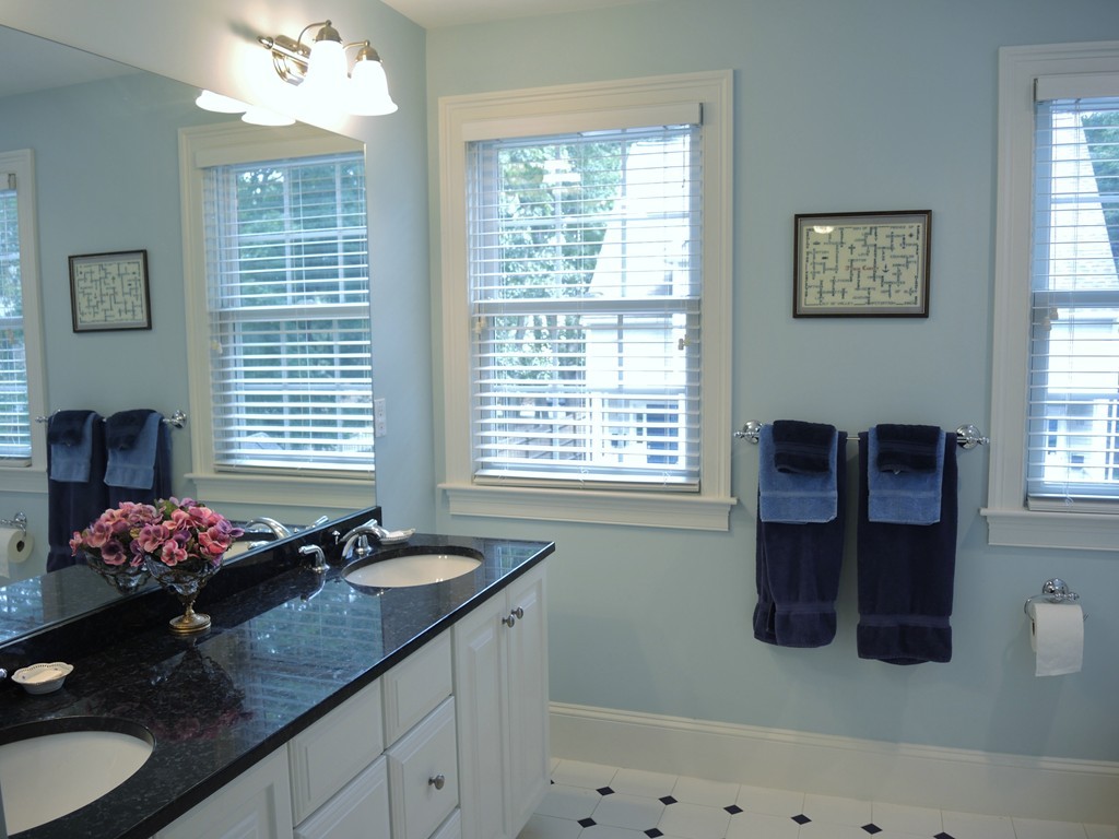 38 Maple Street, Unit 2 Needham, MA 02492 - Photo 16 of 26 a kitchen with a sink granite counter tops and a window