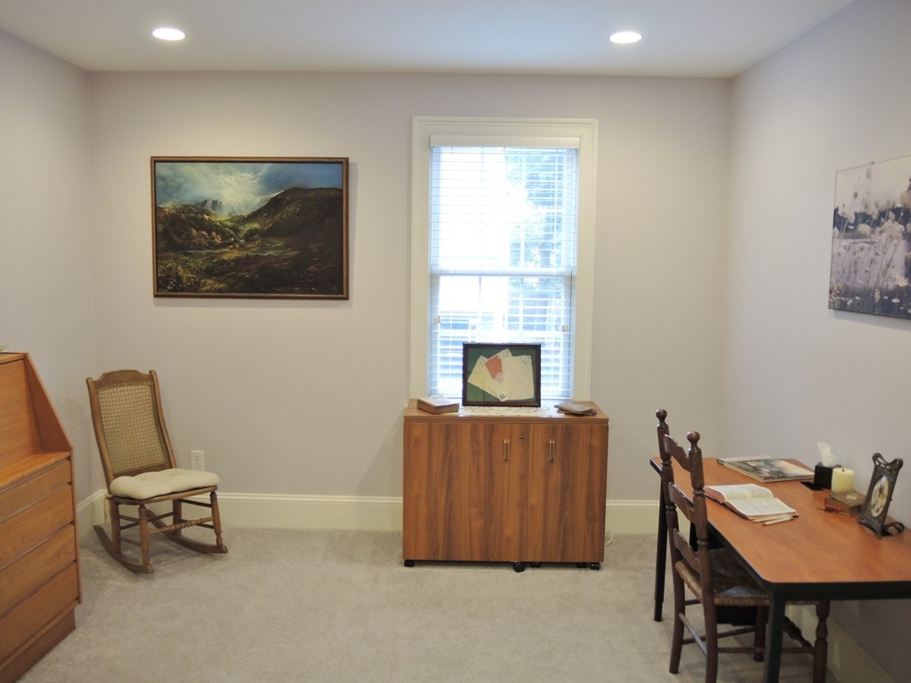 38 Maple Street, Unit 2 Needham, MA 02492 - Photo 22 of 26 a living room with furniture and a window