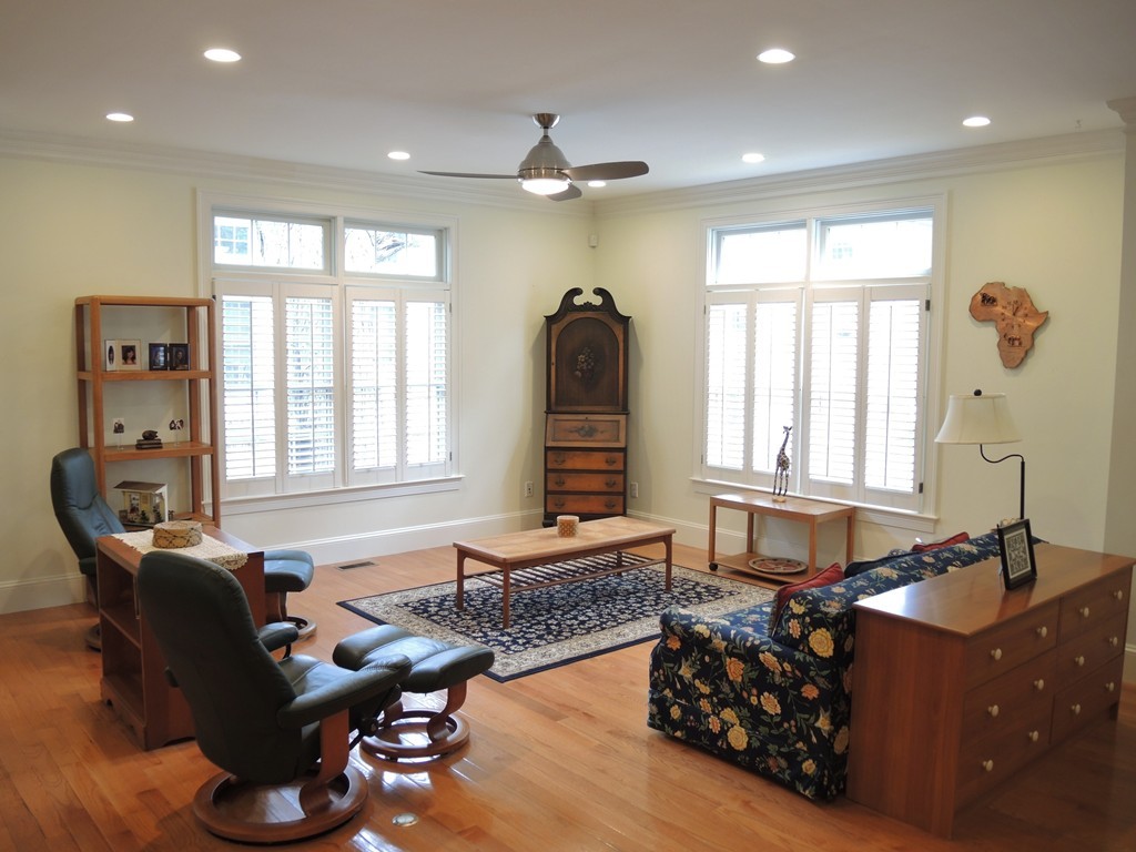 38 Maple Street, Unit 2 Needham, MA 02492 - Photo 3 of 26 a living room with furniture and a window