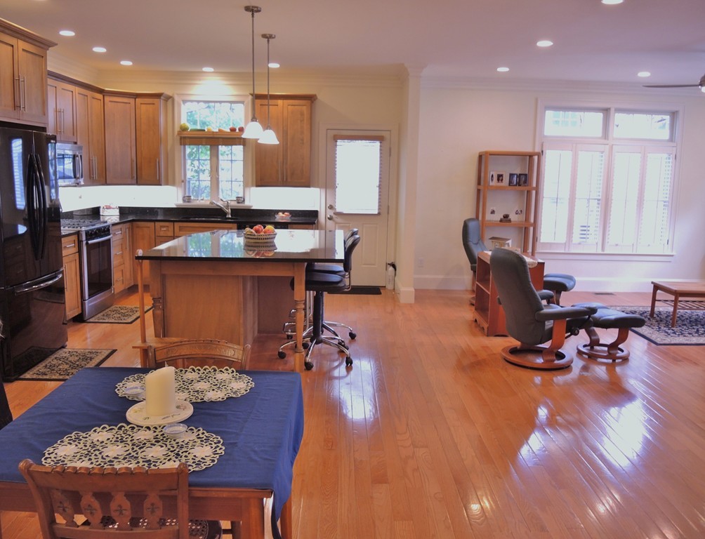 38 Maple Street, Unit 2 Needham, MA 02492 - Photo 9 of 26 a room with furniture pool table and kitchen view