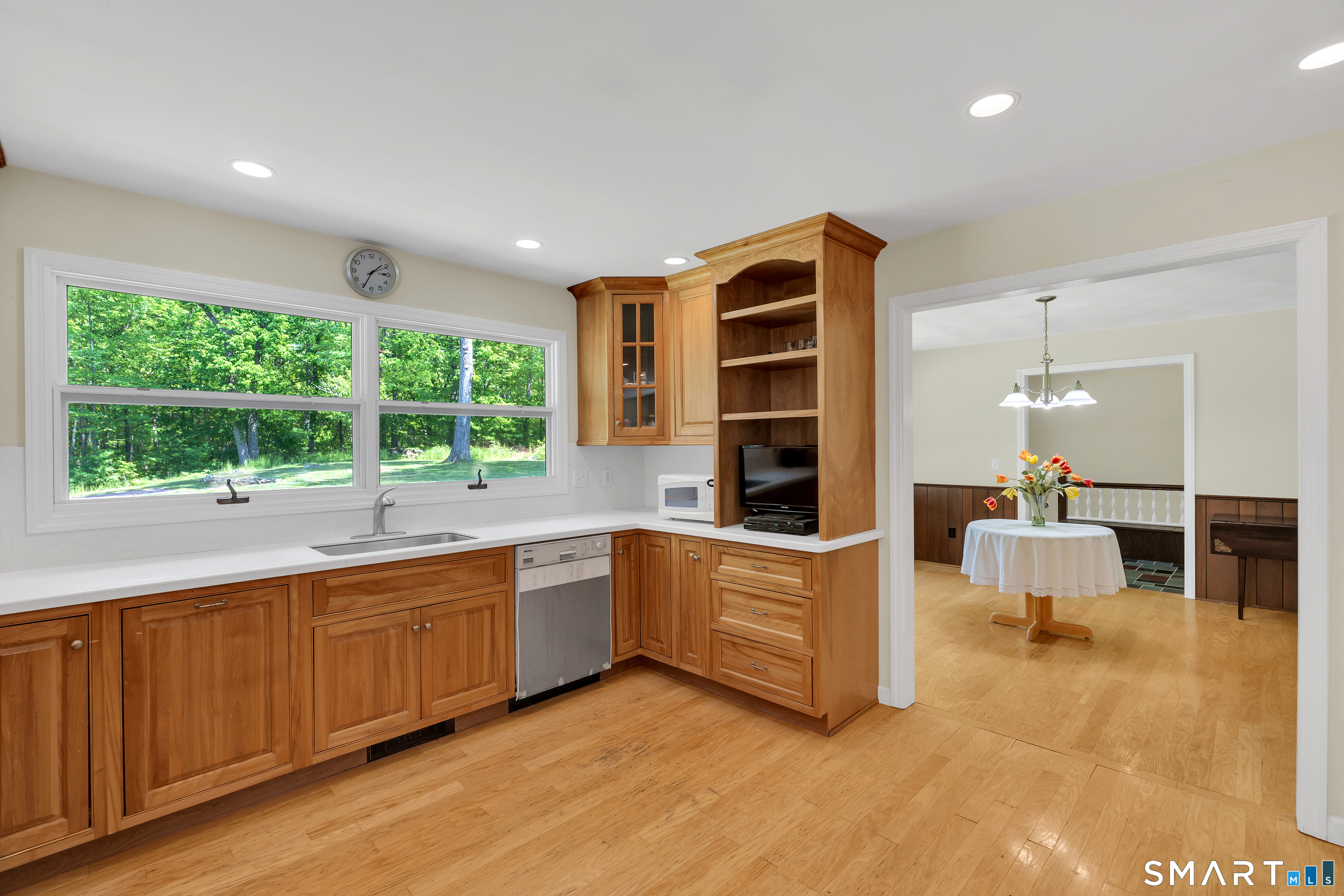 30 Maltbie Road Newtown, CT 06470 - Photo 17 of 40 a large white kitchen with a large window
