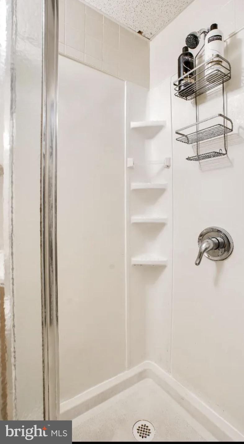 1837 Chestnut Street Philadelphia, PA 19103 - Photo 3 of 7 a bathroom with a shower