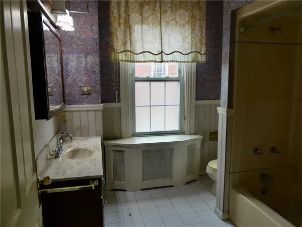 a bathroom with a sink and a bathtub