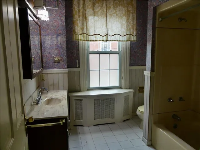 a bathroom with a sink and a bathtub