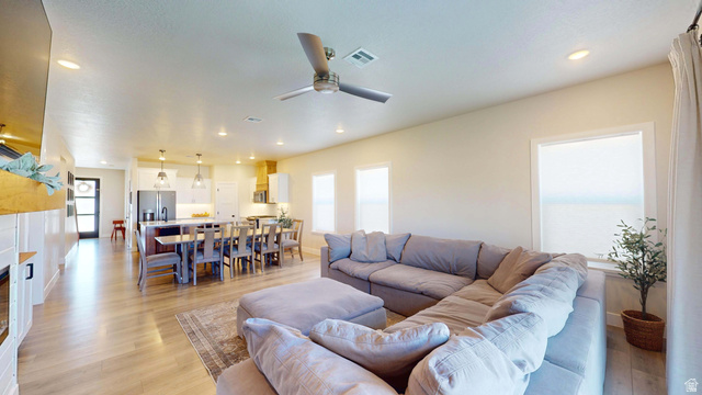 1127 4240 North Enoch, UT 84721 - Photo 15 of 56 Living room featuring light wood-style flooring, ceiling fan, and recessed lighting