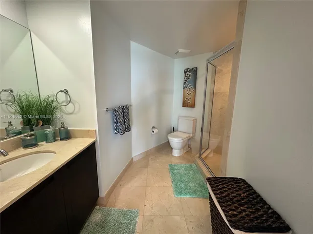 a room with gym equipment and a large window