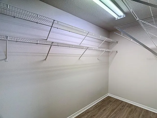 a view of a room with racks on the wall