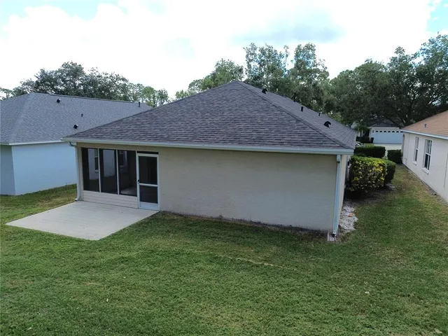 a view of a backyard with a garden