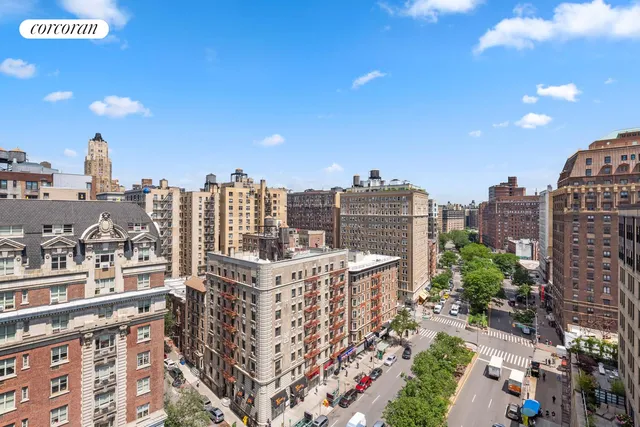 a view of a city with tall buildings