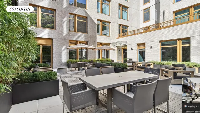 a view of living room with furniture and a flat screen tv
