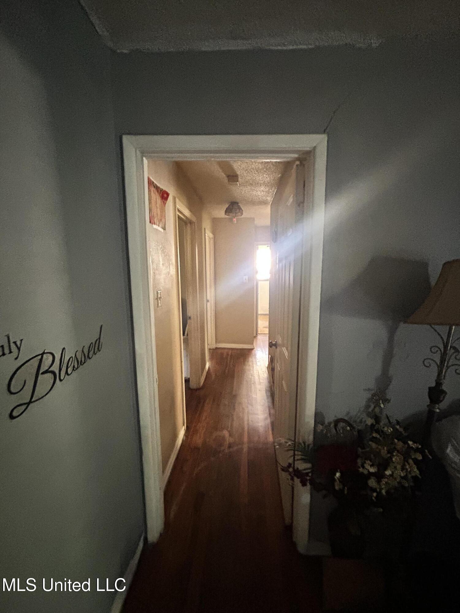110 Laws Hill Road Holly Springs, MS 38635 - Photo 8 of 13 Hallway to bedrooms and bathrooms