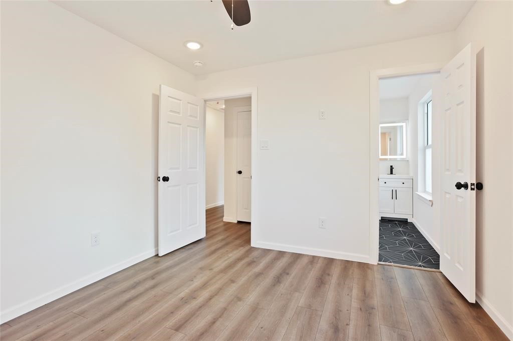 310 Delmar Street, Unit C Houston, TX 77011 - Photo 11 of 11 a view of a hallway with wooden floor