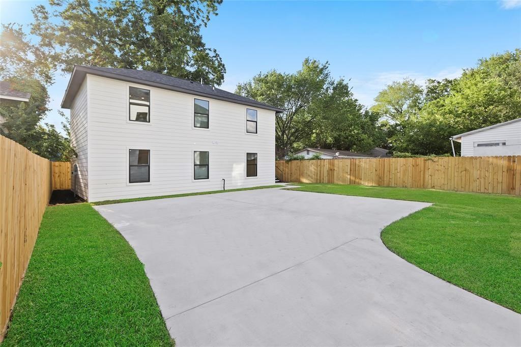 310 Delmar Street, Unit C Houston, TX 77011 - Photo 2 of 11 a view of a house with a yard