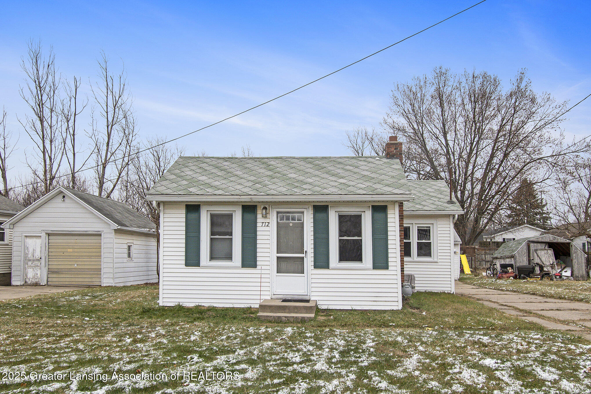 712 West Sheridan Road Lansing, MI 48906 - Photo 1 of 16 Front