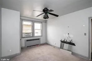 a room with ceiling fan