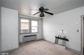 1618 Roundhill Road Baltimore, MD 21218 - Photo 24 of 47 a room with ceiling fan