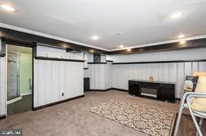 a view of livingroom with refrigerator