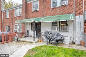 1618 Roundhill Road Baltimore, MD 21218 - Photo 42 of 47 a backyard of a house with seating space