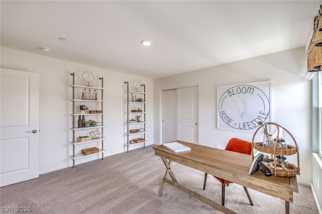 1017 Copper Robin Street Henderson, NV 89011 - Photo 33 of 43 Photo is representational only; actual home finishes may vary. Office with carpet, baseboards, and recessed lighting
