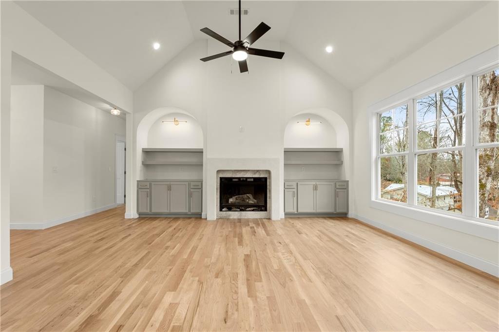 2020 Darby Road Waleska, GA 30183 - Photo 17 of 49 a view of an empty room with a window and a kitchen