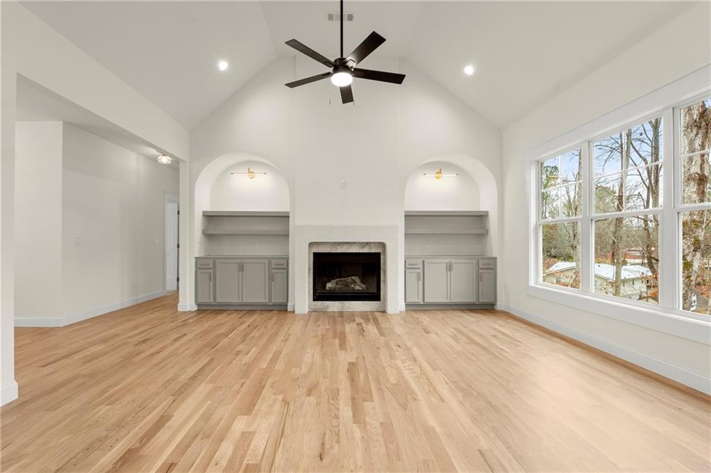 2020 Darby Road Waleska, GA 30183 - Photo 18 of 49 a view of an empty room with a fireplace and a window