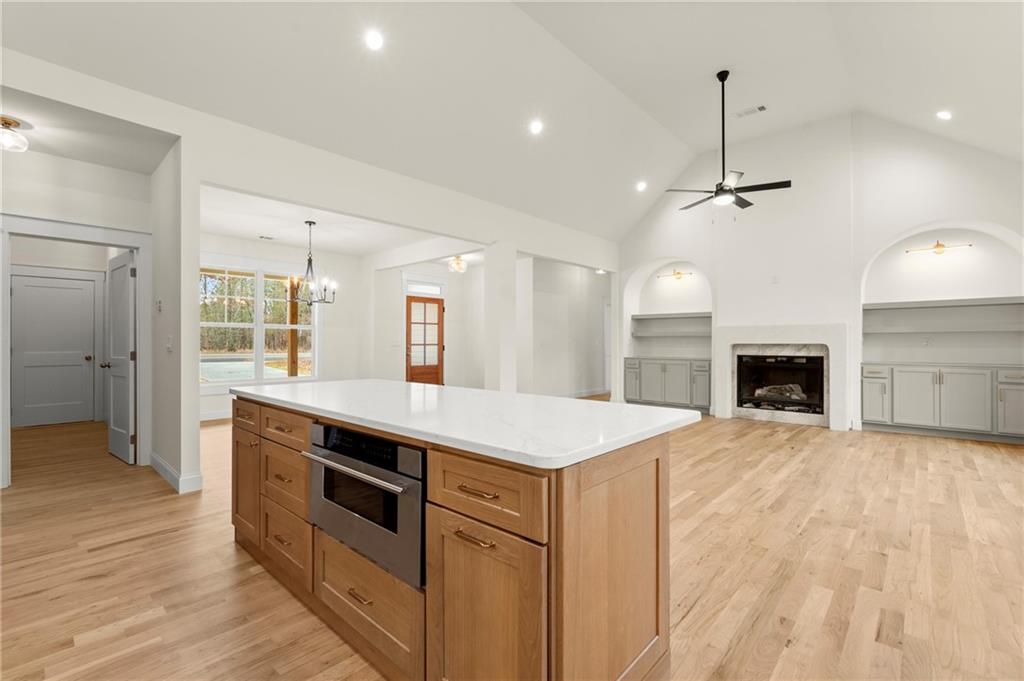 2020 Darby Road Waleska, GA 30183 - Photo 20 of 49 a kitchen with stainless steel appliances granite countertop a sink a stove and a refrigerator