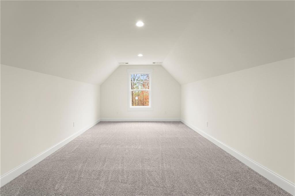 2020 Darby Road Waleska, GA 30183 - Photo 41 of 49 an empty room with a windows and a ceiling fan